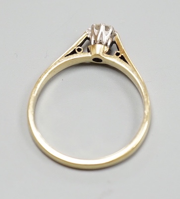 A modern 18ct gold and solitaire diamond ring, size N, gross weight 2.5 grams.